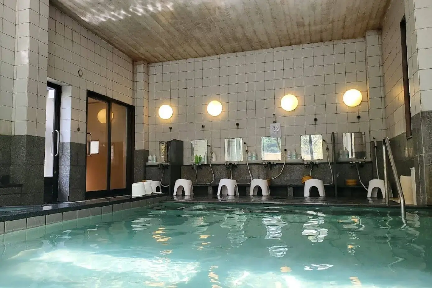 Shower area inside an onsen bath
