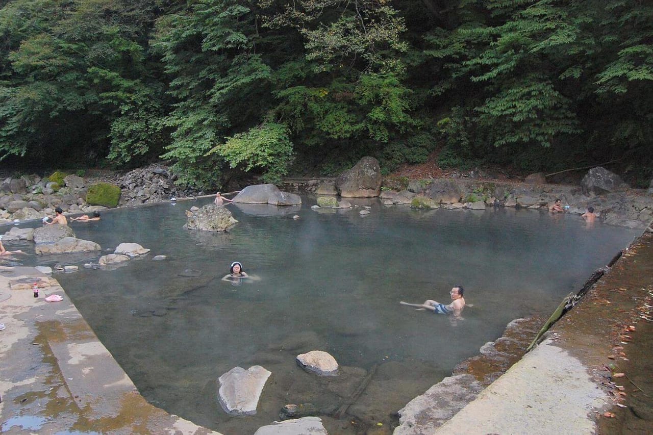 Swimsuited bathers in Shiriyaki Onsen Japan